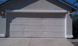 cracked panel garage door