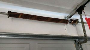 Before and After Garage Door Spring Repair